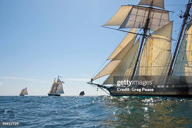 schooners racing off gloucester harbor - greg pease stock pictures, royalty-free photos & images