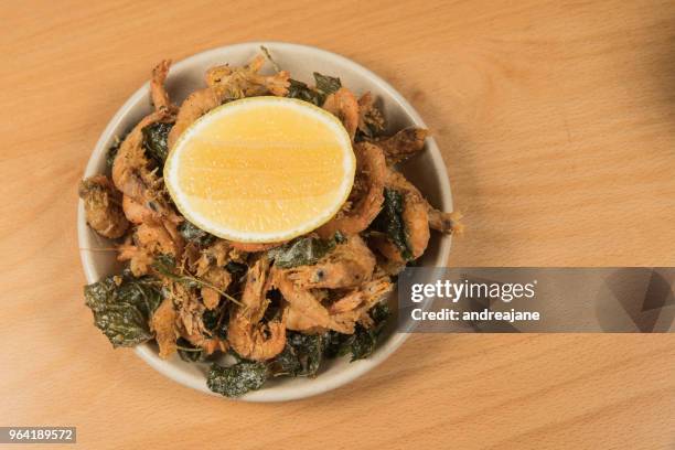 prawns beside the waters edge - mooloolaba stock pictures, royalty-free photos & images