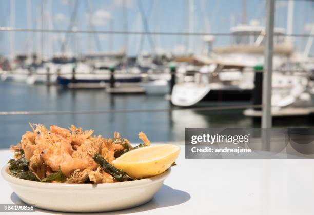 prawns beside the waters edge - mooloolaba stock-fotos und bilder