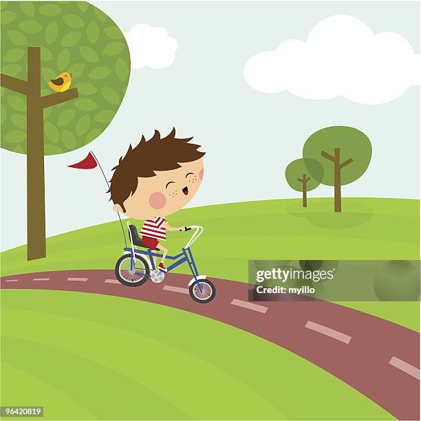 happy boy riding a bicycle. cycle path and nature - bicycle lane stock illustrations