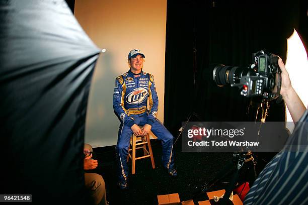 Kurt Busch, driver of the Miller Lite Dodge, poses during NASCAR media day at Daytona International Speedway on February 4, 2010 in Daytona Beach,...