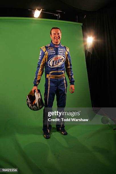 Kurt Busch, driver of the Miller Lite Dodge, poses during NASCAR media day at Daytona International Speedway on February 4, 2010 in Daytona Beach,...