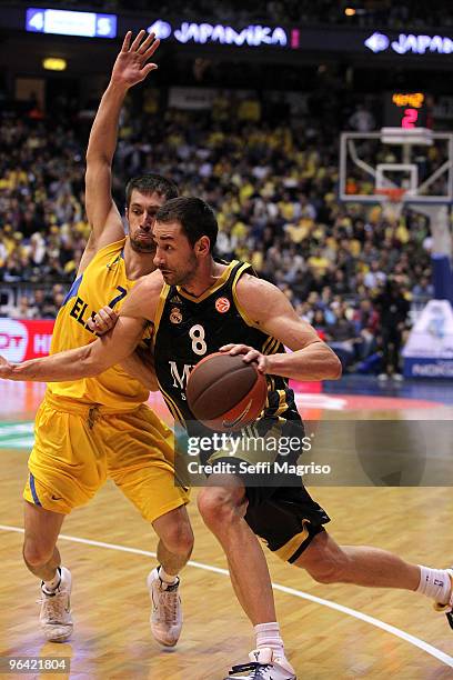 Marko Jaric, # 8 of Real Madrid competes with Andrew Wisniewski, #7 of Maccabi Electra Tel Aviv in action during the Euroleague Basketball 2009-2010...