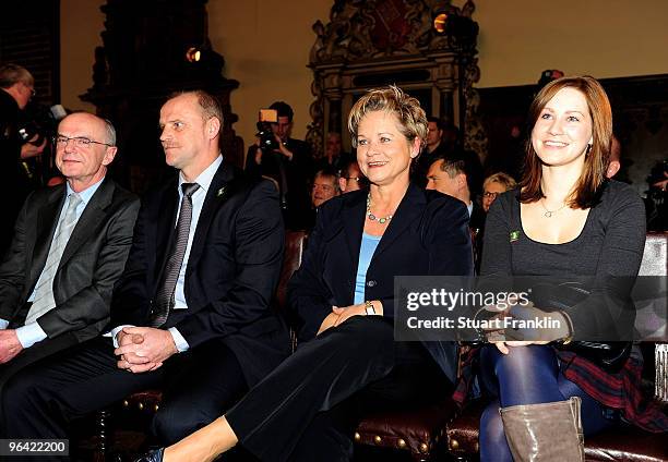 Karl-Dieter Fischer, Thomas Schaaf, head coach of Werder Bremen, Astrid Schaaf and daughter Valeska Schaaf are pictured during the celebration of the...