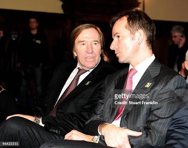 Television presenter Gunter Netzer talks with a guest during the celebration of the 111th year of SV Werder Bremen at the town hall on February 4,...