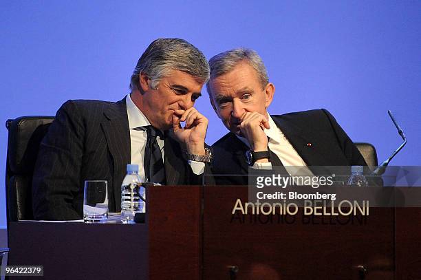 Antonio Belloni, managing director of LVMH Moet Hennessy Louis Vuitton SA, left, and Bernard Arnault, chairman and chief executive officer, speak...