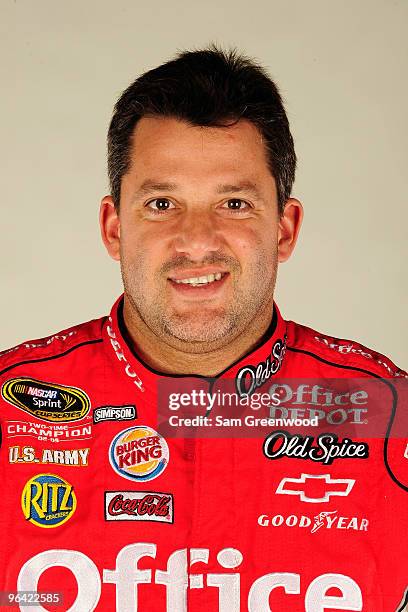 Tony Stewart, driver of the Old Spice/Office Depot Chevrolet, poses during NASCAR media day at Daytona International Speedway on February 4, 2010 in...