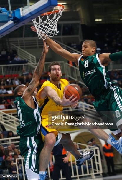 Mike Batiste, #8 of Panathinaikos Athens competes with Kostas Kaimakoglou, #15 of Maroussi BC during the Euroleague Basketball 2009-2010 Last 16 Game...