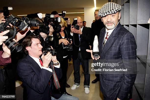 Shoe Designer Christian Louboutin attends the 'Christian Louboutin' cocktail reception at The Corner Shop on February 4, 2010 in Berlin, Germany.