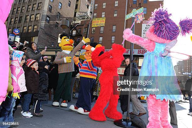 Sesame Street characters Bert, Ernie, Elmo and Abby Cadabby attend the temporary street renaming to celebrate the 30th anniversary of Sesame Street...