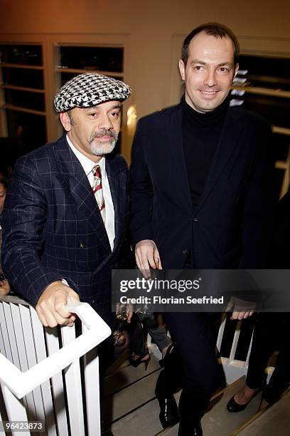 Shoe Designer Christian Louboutin and Emmanuel de Bayser attend the 'Christian Louboutin' cocktail reception at The Corner Shop on February 4, 2010...