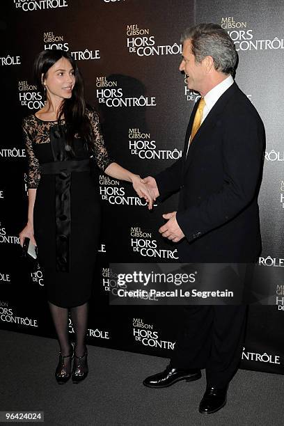 Oksana Grigorieva and U.S actor Mel Gibson pose as they attend the film premiere of "Edge Of Darkness" at Cinema UGC Normandie on February 4, 2010 in...