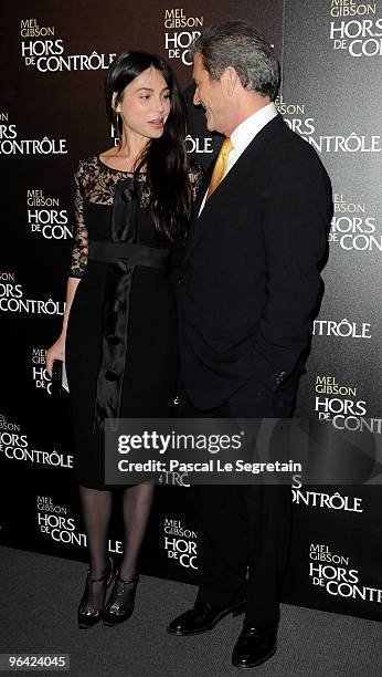 Oksana Grigorieva and U.S actor Mel Gibson pose as they attend the film premiere of "Edge Of Darkness" at Cinema UGC Normandie on February 4, 2010 in...