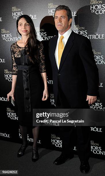 Oksana Grigorieva and U.S actor Mel Gibson pose as they attend the film premiere of "Edge Of Darkness" at Cinema UGC Normandie on February 4, 2010 in...