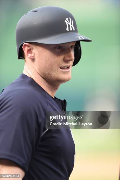 Clint Frazier of the New York Yankees looks on during batting practice of a baseball game against the Washington Nationals at Nationals Park on May...