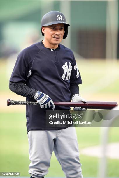 Ronald Torreyes of the New York Yankees looks on during batting practice of a baseball game against the Washington Nationals at Nationals Park on May...