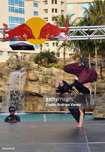 Super Cr3w performs with Rick Ross at the Red Bull Super Pool at Seminole Hard Rock Hotel on February 4, 2010 in Hollywood, Florida.