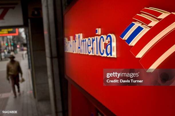 Pedestrian walks past an ATM near the Bank of America headquarters on February 4, 2010 in Charlotte, North Carolina. Bank of America's former Chief...