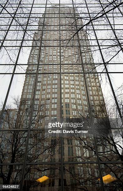 The Bank of America headquarters is reflected in the windows of the Bank of America Plaza building on February 4, 2010 in Charlotte, North Carolina....