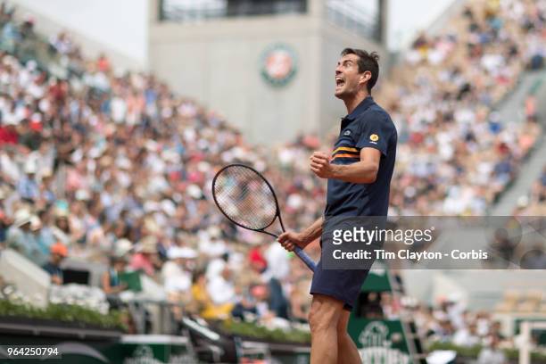 French Open Tennis Tournament - Day Two. Guillermo Garcia-Lopez of Spain celebrates his five set victory over Stan Wawrinka of Switzerland on Court...