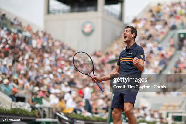 French Open Tennis Tournament - Day Two. Guillermo Garcia-Lopez of Spain celebrates his five set victory over Stan Wawrinka of Switzerland on Court...