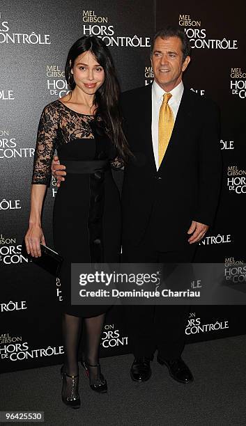 Actor Mel Gibson and Oksana Grigorieva attend the film premiere of "Edge Of Darkness" at Cinema UGC Normandie on February 4, 2010 in Paris, France.