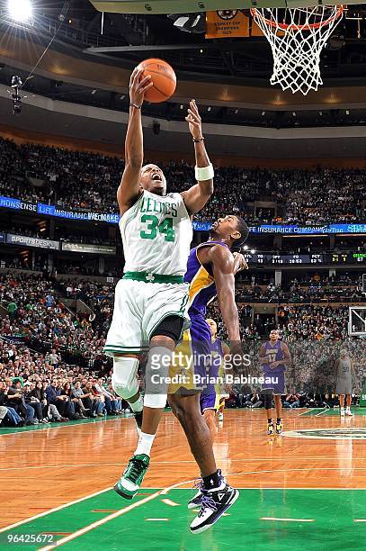 Paul Pierce of the Boston Celtics goes to the basket against Ron Artest of the Los Angeles Lakers during the game on January 31, 2010 at TD Banknorth...