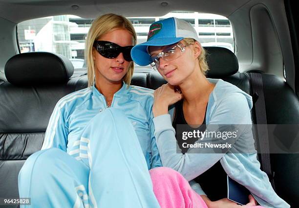 American socialites Nicky Hilton and Paris Hilton arrive at Melbourne Airport for the Spring Racing Carnival and the Melbourne Cup.