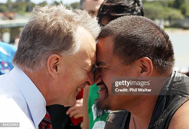 Labour Party leader Phil Goff shares a Hongi with local Maori outside TeTii Marae on February 5, 2010 in Waitangi, New Zealand. Waitangi Day is the...