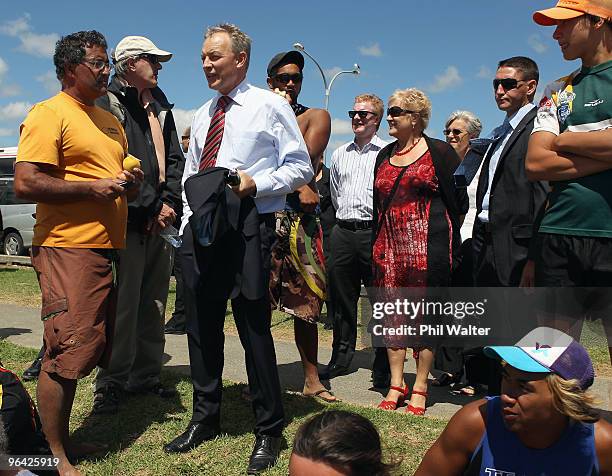 Labour Party leader Phil Goff meets with some of the Waka crew outside TeTii Marae on February 5, 2010 in Waitangi, New Zealand. Waitangi Day is the...