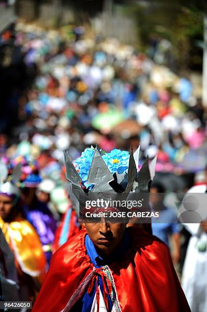 Man dressed as a Christian warrior participates in the procession "Los Niños Zarcos" , in the town of San Pedro Nonualco, 62 km south of San...