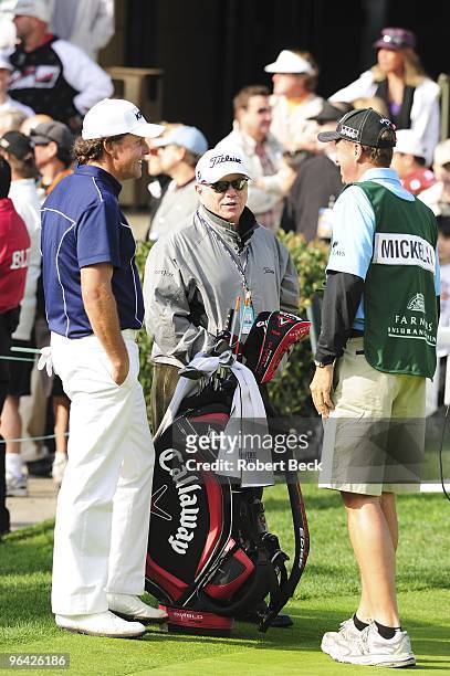 Farmers Insurance Open: Golf instructor and coach Butch Harmon with Phil Mickelson and caddie Jim Mackay during Sunday play at Torrey Pines GC. La...