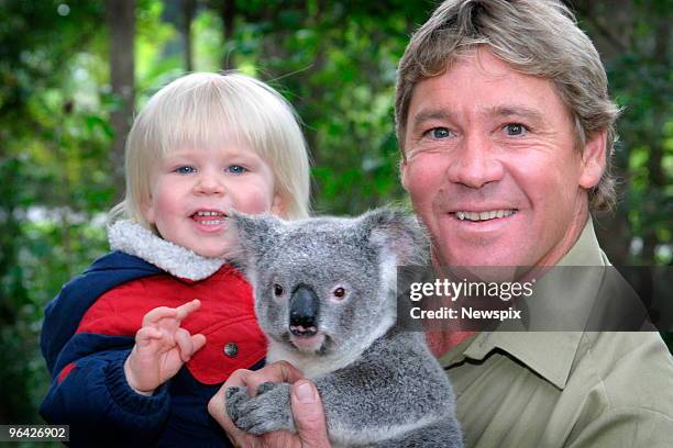 Crocodile Hunter' Steve Irwin with his son, Bob Irwin, and a Koala at Australia Zoo.