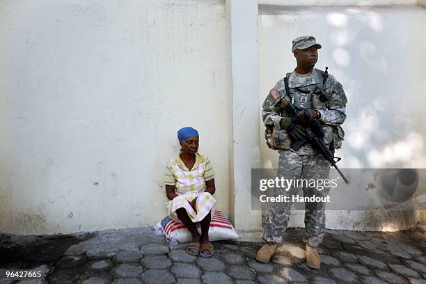 In this handout image provided by the United Nations Stabilization Mission in Haiti , the United Nations' Peruvian Peacekeepers and the US Army...