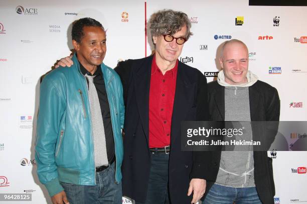 Abderrahmane Sissako, Wim Wemders and Jan Kounen attend the "8" movie premiere at Le Grand Rex on February 4, 2010 in Paris, France.