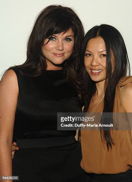 Actress Tiffani Thiessen and Designer Thuy Diep attend Thuy Spring 2010 during Mercedes-Benz Fashion Week at Bryant Park on September 13, 2009 in New...