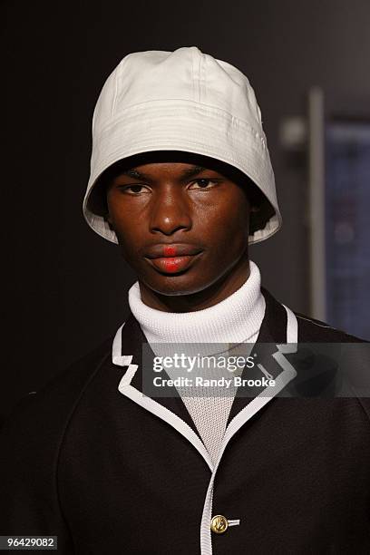 Model walks the runway at the Thom Browne Spring 2010 fashion show during Mercedes-Benz Fashion Week at TBD on September 13, 2009 in New York City.