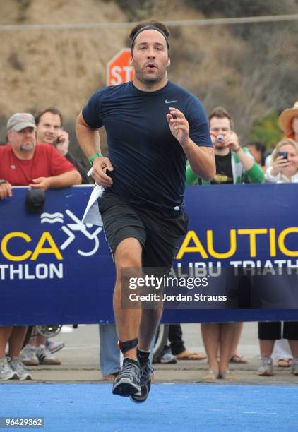 Actor Jeremy Piven finishes in the 23rd Annual Nautica Malibu Triathalon at Zuma Beach on September 13, 2009 in Malibu, California.