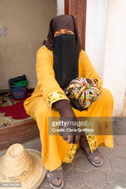 portrait of lady selling metal bands and bracelets, marrakech - burqa for sale stock pictures, royalty-free photos & images