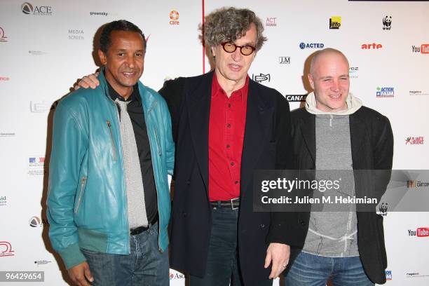 Abderrahmane Sissako, Wim Wemders and Jan Kounen attend the "8" movie premiere at Le Grand Rex on February 4, 2010 in Paris, France.