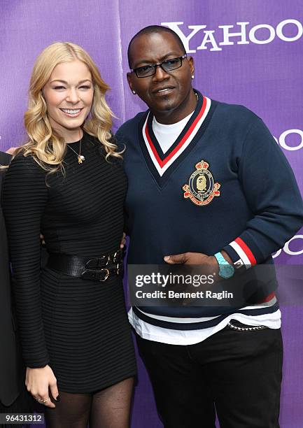 LeAnn Rimes and Randy Jackson attend the It's Y!ou Yahoo! yodel competition at Military Island, Times Square on October 13, 2009 in New York City.