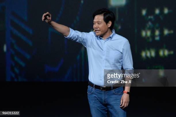 Lei Jun, chief executive officer of Xiaomi Corp., presents the company's Mi 8 smartphone during the Xiaomi Launches Its Flagship Products In Shenzhen...