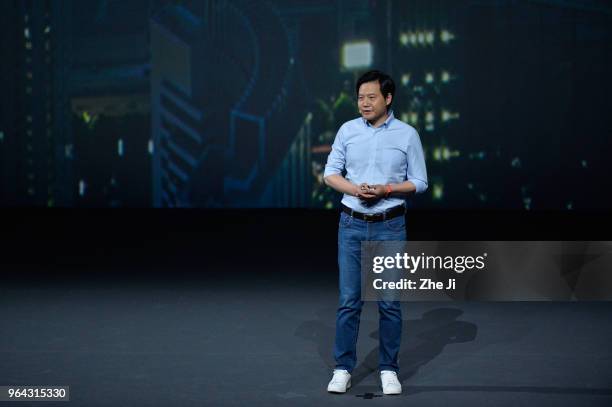 Lei Jun, chief executive officer of Xiaomi Corp., presents the company's Mi 8 smartphone during the Xiaomi Launches Its Flagship Products In Shenzhen...