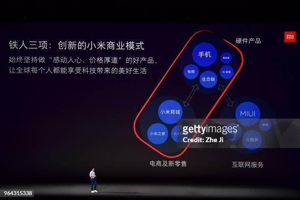 Lei Jun, chief executive officer of Xiaomi Corp., presents the company's Mi 8 smartphone during the Xiaomi Launches Its Flagship Products In Shenzhen...