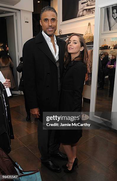 Rick Fox and Eliza Dushku attend the Guess by Marciano and ELLE event benefiting the Susan G. Komen Foundation at the Guess Boutique on February 4,...