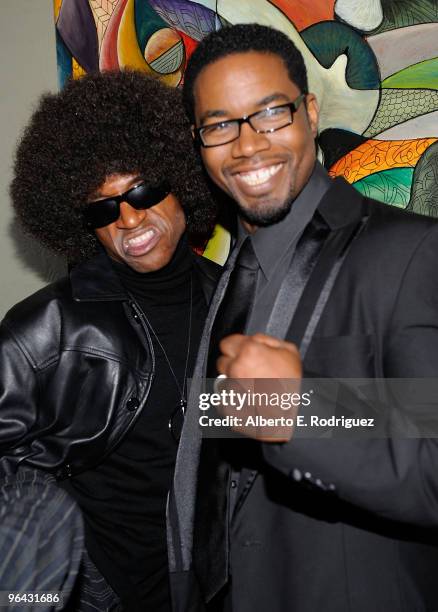 Actor Tommy Davidson and actor Michael Jai White attend the after party for the Los Angeles premiere of "Black Dynamite" on October 13, 2009 in...