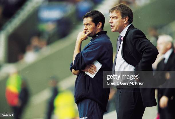 Bolton Wanderers Manager Sam Allardyce and Coach Phil Brown watch the action during the FA Barclaycard Premiership match between Bolton Wanderers and...