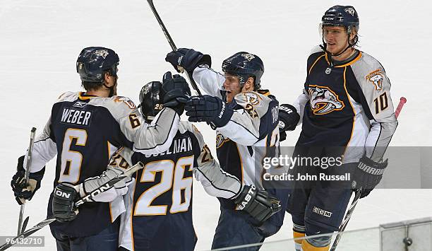 Shea Weber, Steve Sullivan, Patric Hornqvist, and Martin Erat of the Nashville Predators celebrate a goal against the Colorado Avalanche on February...