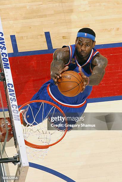 LeBron James of the Cleveland Cavaliers gets in for a dunk while playing the Miami Heat on February 4, 2010 at the Quicken Loans Arena in Cleveland,...