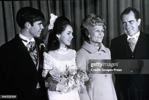 David Eisenhower and wife Julie Eisenhower pose with with her parents Pat Nixon and President-elect Richard Nixon after their wedding ceremony.